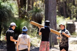 a group of boys solving a challenge together